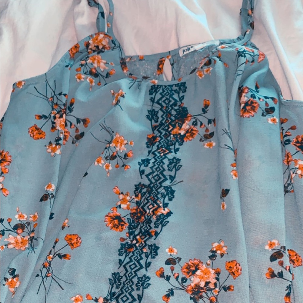 an off the shoulder flowy floral top